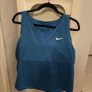 Nike dri fit Athletic Tank more of a turquoise blue color